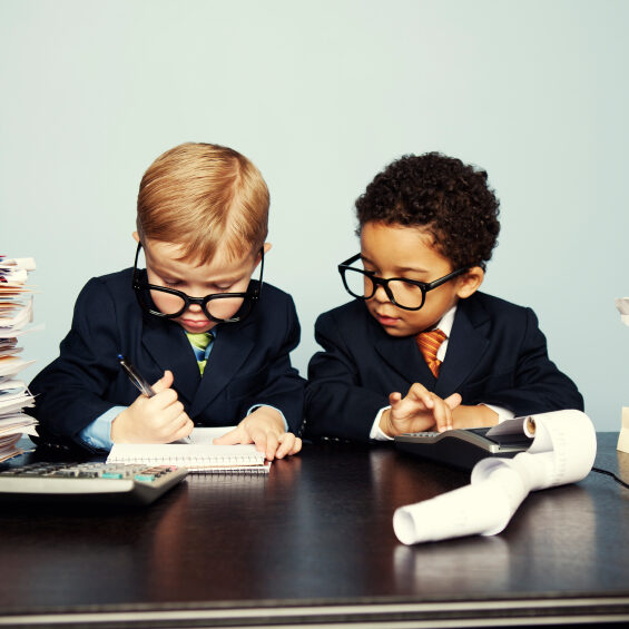 Children pretending to work as accountants